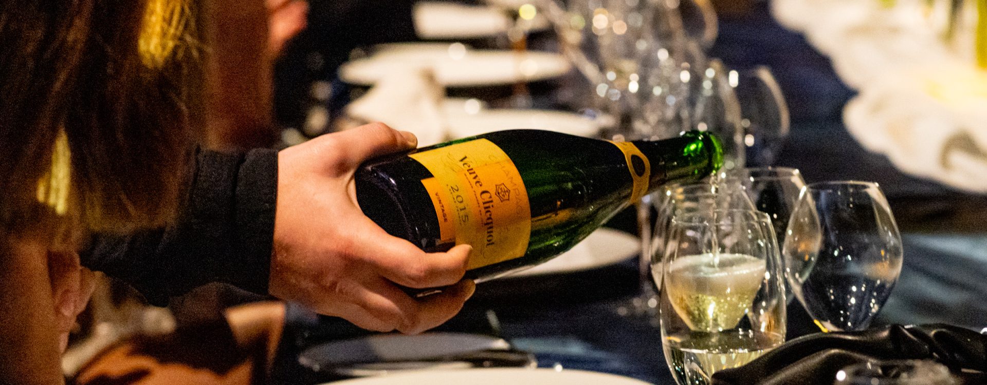 Waiter pouring veuve